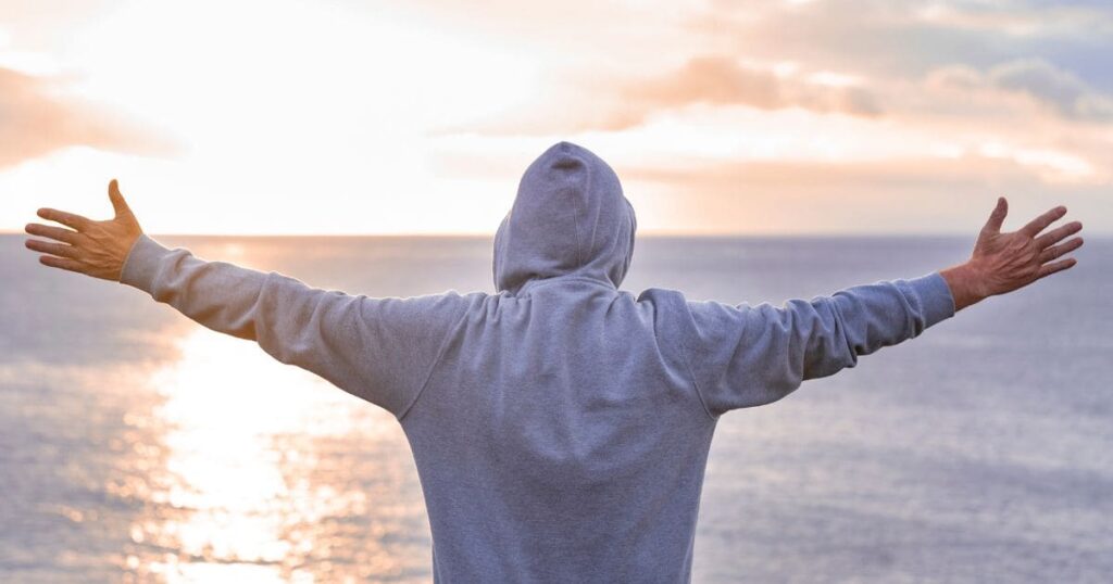 A smiling senior woman confidently using a checklist in her cozy, well-lit home.